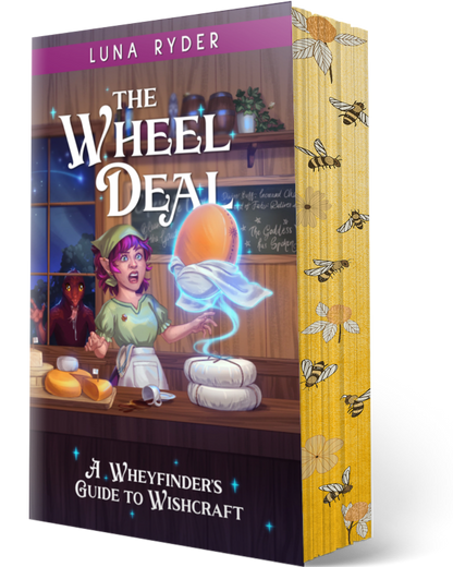The Wheel Deal: A Wheyfinder's Guide to Wishcraft book by Luna Ryder, shown as a 3D book mockup with a detailed fantasy illustration on the front cover and a yellow spine decorated with whimsical bees.
